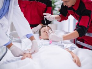 doctors-adjusting-oxygen-mask-while-rushing-patient-emergency-room_107420-63712