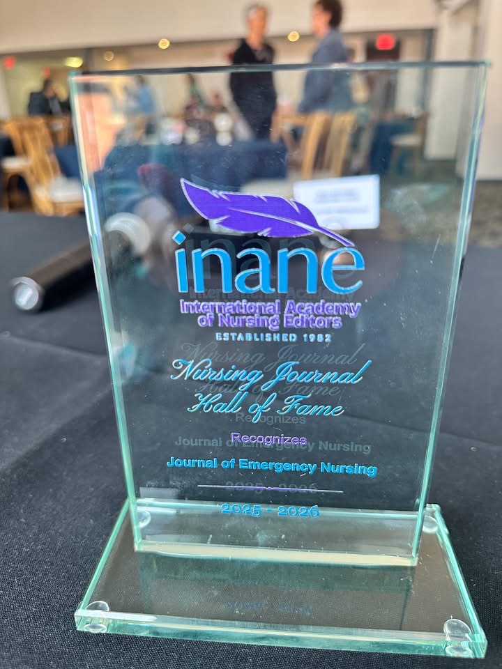 A glass award for the Nursing Journal Hall of Fame presented by INANE, recognizing the Journal of Emergency Nursing for the years 2025-2026.